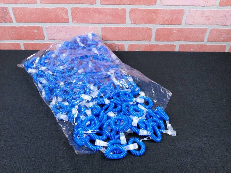 lot 225 image: Stretchable Coil Bracelets With ID Tag