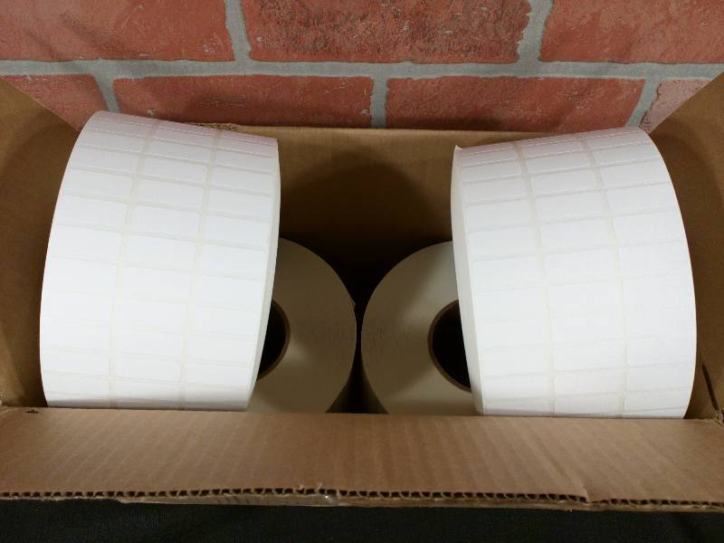 lot 255 image: Blank Labels with Perforations 3up 3 core 8 Outer Diameter