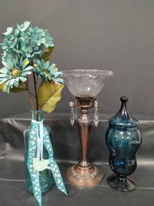 lot 128 image: Decorative Glass Set - Teal Bottle, Bronze Candleholder, Blue Apothecary Jar