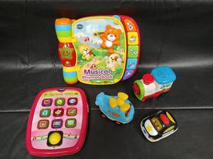 lot 138 image: VTech Educational Toy Bundle - Musical Book, Tablet, and Vehicles(tested, works)