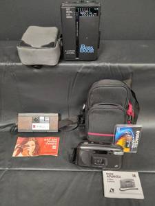 lot 151 image: Vintage Electronics Lot - Lloyds Bass Boost Walkman, GAF 220 Camera, Kodak Advantix 3100AF