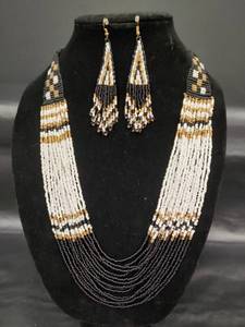 lot 223 image: Black and White 25 Inch Waterfall Torsade Necklace with Matching Pierced Earrings