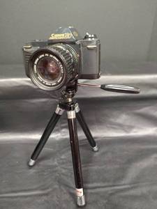 lot 245 image: Canon T50 Camera with Tripod