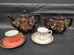 lot 312 image: Vintage Brown Glazed Teapots with Gold Floral Design and Teacups