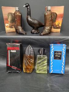 lot 374 image: Mens Parfume Fragrances and Decanters - Dakota Paris (Full), Arctic Blue. (Full) 2 Wild Country Boot Decanters (Empty) and Canadian Goose Decanter (Empty)