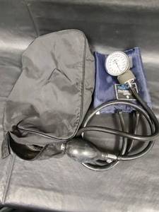 lot 556 image: Omron Tru-Gage Cuff Manual Blood Pressure Monitor, Includes Black Storage Bag