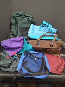 lot 557 image: Mixed Lot of Backpacks and Bags - Evergreen Canvas Backpack, AViD Nylon Backpack and More