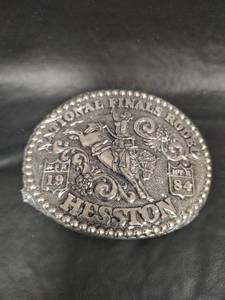 lot 558 image: NIP 1984 NFR National Finals Rodeo Hesston Belt Buckle