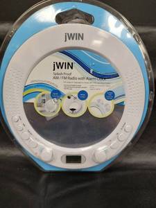 lot 452 image: NIP jWIN Splash Proof AMFM Radio Alarm Clock with Suction Cup Mounting and Stand