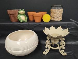 lot 461 image: Outdoor Home Decor Collection - Wrought Iron Globe Stand, Ceramic Planter, Outdoor Candles, Woven Jar and Ceramic Frog Planter