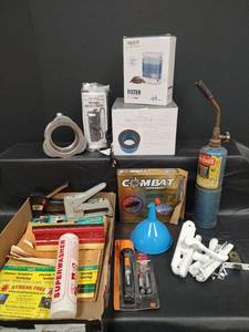 lot 501 image: Assorted Collection - Benzomatic Propane BottleTorch, Replacement Air Filter, Water Filters, Kenmore Garbage Disposal Mounting Ring, Combat Bait and More