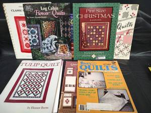 lot 512 image: Quilting Pattern Book Collection - Log Cabin, Christmas, Floral, Classic Patterns and a Creative Serging Illustrated Book