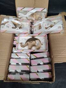 lot 519 image: Gold- tone Elephant Bottle Opener Baby Shower Favors, Qty 24