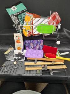 lot 521 image: Mixed Lot Bundle - Vera Bradley Batik Makeup Case, 19 inch Hanging Basket, New Mini Silicone Baking Cups, New Silicone Scrubber, New Mitt Hot Pad, New Garden Diva Apron, New Car Interior Headrest Hooks and More