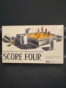 lot 569 image: Three Dimensional Family Game Score Four
