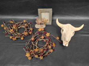lot 593 image: Western Decor Set - Primitive Rusty Star Pipberry Candle Rings, Decorative Steer Skull, Saddle Frame