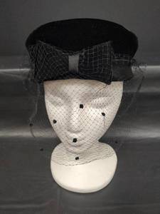 lot 621 image: Vintage Black Velvet Pillbox Hat with Bow and Black Mesh Veil With Polka Dot Accents