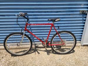 lot 79 image: Original 1970s Chicago Schwinn Cimarron Mountain Bike - Red Frame- Original Seat Included