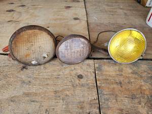 lot 706 image: Antique Auto Headlights with Yellow Lens and Mounting Brackets