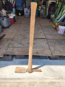 lot 709 image: Antique Double-Bit Axe Head with Wooden Handle
