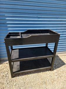 lot 711 image: Wood Changing Table with Shelves 51.5in. x19in x 39in