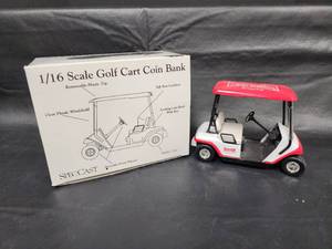 lot 22 image: Little Debbie Snacks 116 Scale Golf Cart Coin Bank by Speccast