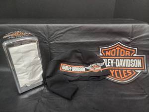 lot 34 image: Harley-Davidson Napkin Dispenser, Logo Headwrap, and Harley Mouse Pad