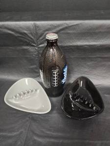 lot 53 image: Football-Themed Beer Bottle and Anholt Ashtray Ceramic Dishes Set