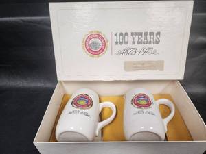 lot 55 image: Coors 100 Year Anniversary Commemorative Beer Steins 1873-1973