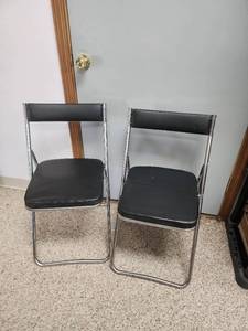 lot 76 image: Black Padded Metal Folding Chairs - Set of 2