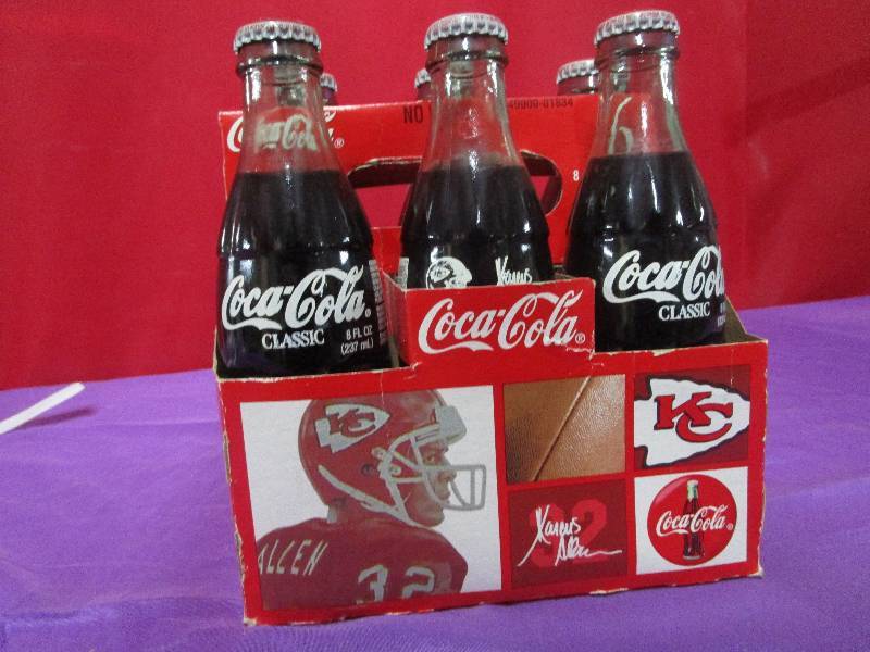lot 8781 image: Marcus Allen Coke Bottles