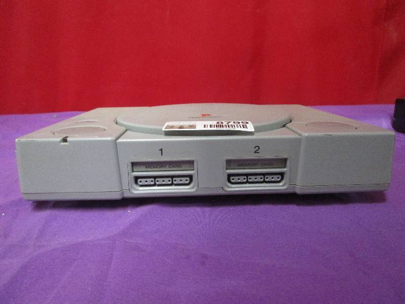 lot 8799 image: PS1 Console no cords