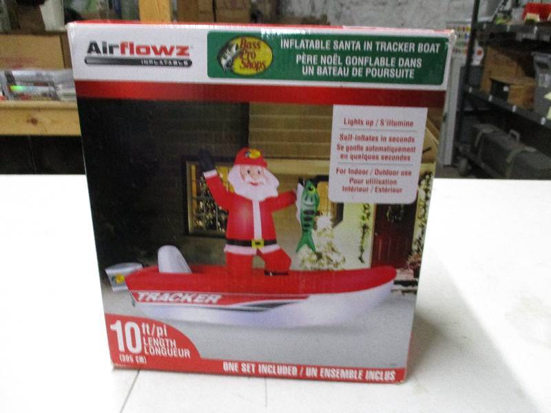 lot 8754 image: Blow Up Santa in Boat