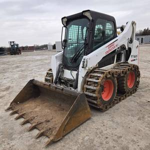 lot 87 image: 2013 Bobcat Skid Steer S570  1129.4 Hours  Steel Over Tire Tracks