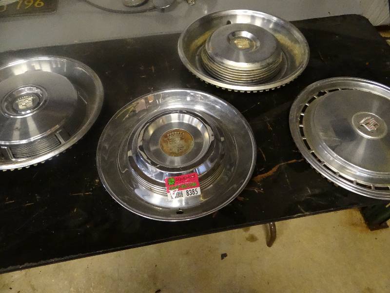 lot 8385 image: Lot of 4 Various Cadillac Hubcaps