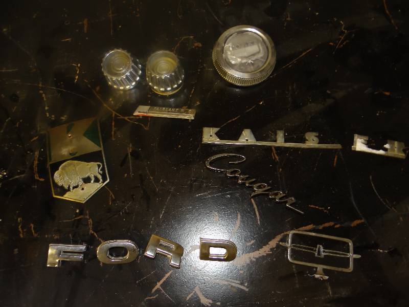 lot 8387 image: Lot of Misc. Antique Car Parts  Emblems
