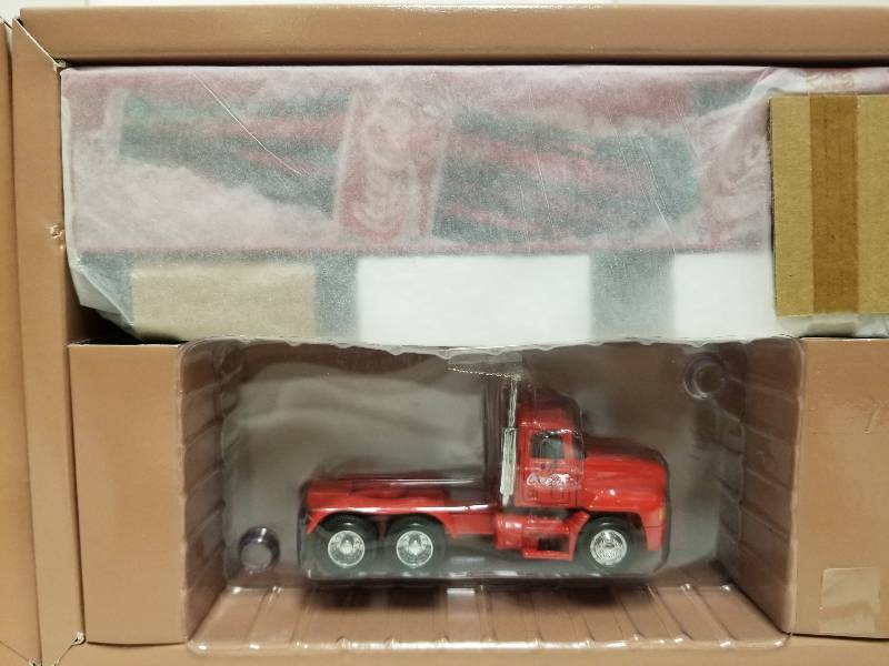 lot 1015 image: Coca-Cola CH600 Tractor Trailer Semi, 164 scale, #C71501, NIB
