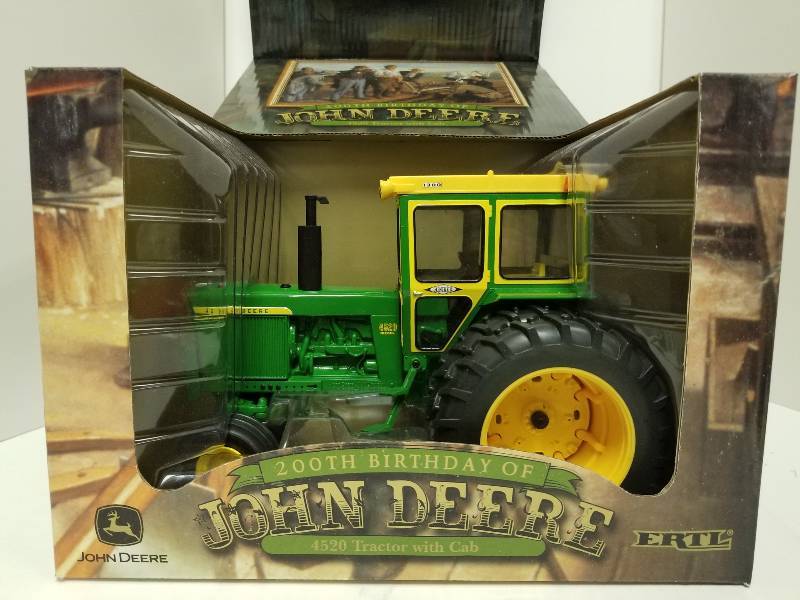 lot 1018 image: RC2Ertl 200 Birthday  John Deere 4520 Tractor with Duals & Hiniker 1300 Cab, 116 scale. #15646A, SEE PIX (NICE) NIB