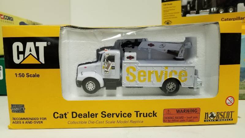 lot 1076 image: CAT Dealer Service Truck, 150 scale, Norscoy Scale Models, NIB, broke mirror