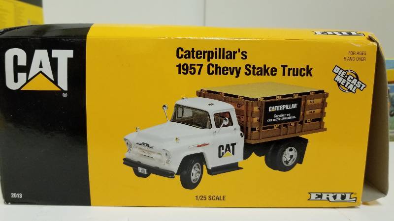 lot 1078 image: CAT Ertl Caterpillars 2957 Chevy Stake Truck, 125 scale, #2013, NIB