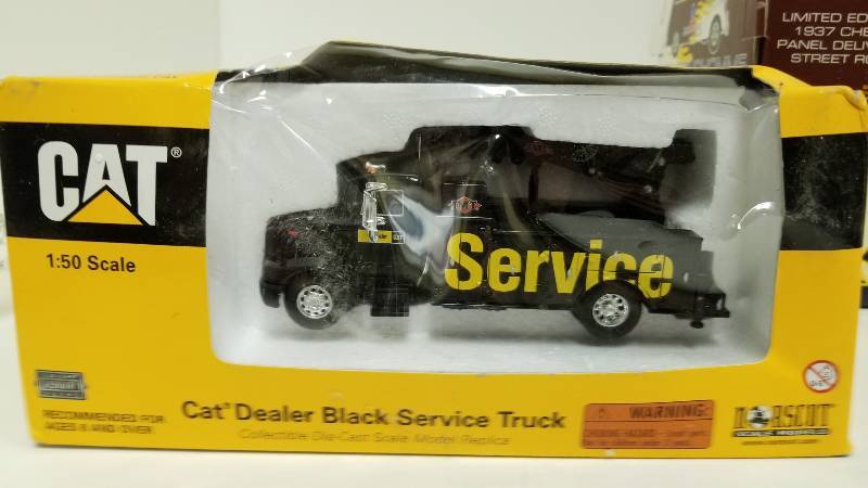 lot 1087 image: Cat Dealer Black Service Truck