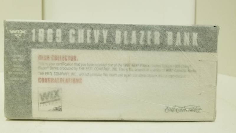 lot 1126 image: WixErtl 1969 Chevy Blazer Bank, 124 scale, NIB and tissue