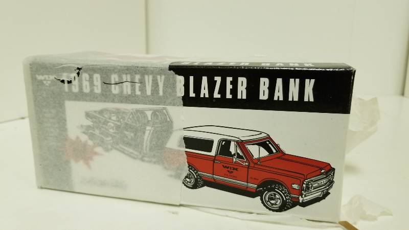 lot 1127 image: WixErtl 1969 Chevy Blazer Bank, 124 scale, NIB and tissue