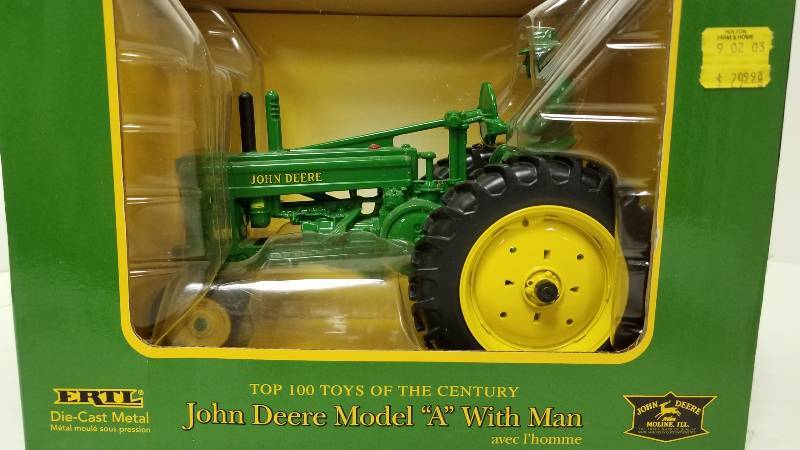 lot 1144 image: Ertl John Deere Model A with Man, #15571, 116 scale, NIB