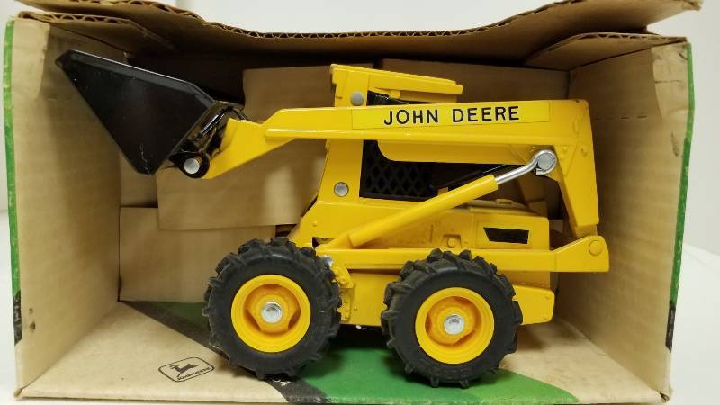 ertl john deere skid steer