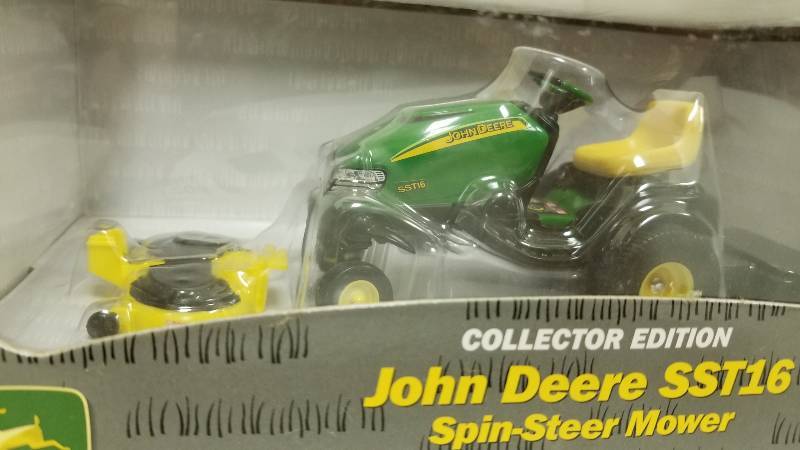 lot 1201 image: Ertl Collector Edition John Deere SST16 Spin-Steer Mower, 116 scale, #15323, NIB