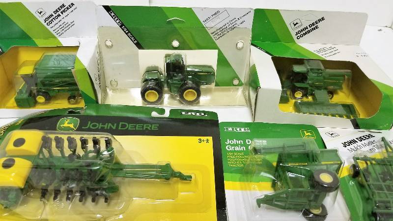 lot 1208 image: 6 Ertl 164 items, JD Combine w2 heads (180 scale, 550 JD 16 row planter, 15380 JD Cotton Picker (180) , 1000EO JD 4 WD Tractyor, 5603EOJD Grain Cart, 5565 JD Mulch Master Tillage plow, 5727, NIB