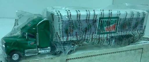 lot 1269 image: Ertl Semi, Mountain Dew IH Cab wTrailer, T055,  164 scale, See Pix for detail, NIB