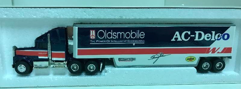 lot 1238 image: Pro-Stock Transporter Collectors wCertificate, AC-Delco Semi, 164 scale, See Pix for Detail, NIB