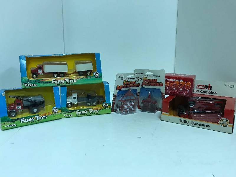 lot 1226 image: 7 Ertl 164 Scale, CASE ih 1660 Combine 22 heads, 655, Grain Truck wPup, 646, Implemet Hauling Flatbed, 645, Fertilizer Truck, 647, Chidel plow, 9606FP, Wing Disc, 1862FO, Case IH Collector Edition MX270 Magnum  1998, 14031A, All NIB